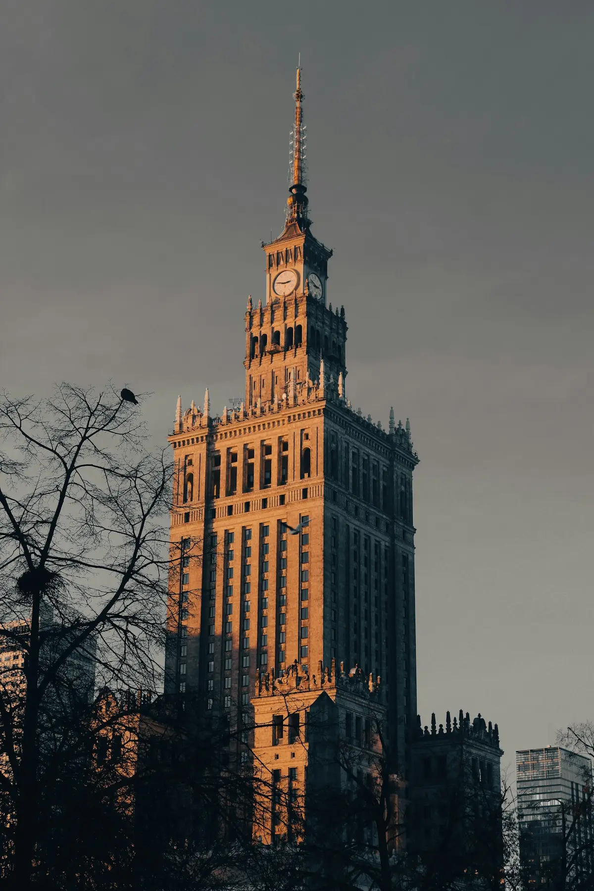 The Palace of Culture and Science in Warsaw, lit by the evening sun